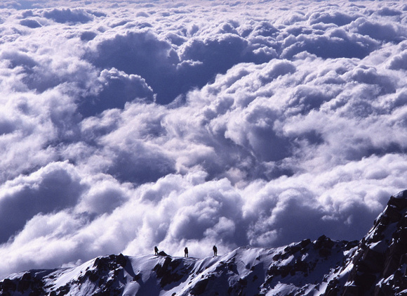 Climbers and clouds. West Buttress, Denali