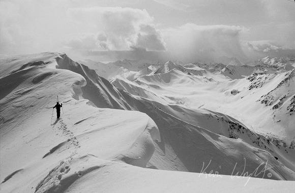Corniced ridge and skier, Seldovia